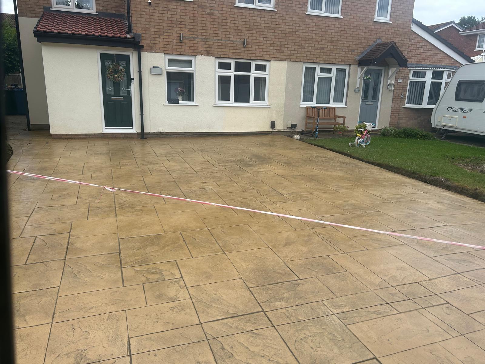 Sand effect imprinted concrete driveway, warm natural stone finish, Warrington